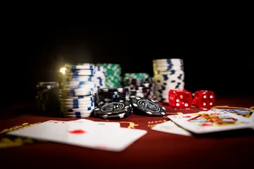 A professional dealer in a tuxedo greeting players at the roulette table, symbolizing the authentic live casino feel at 456BD.