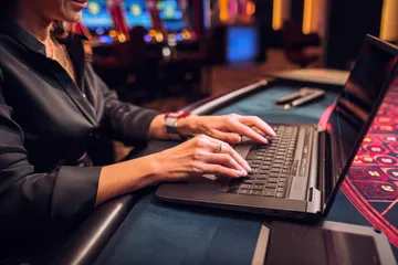 A laptop glowing with a bright login prompt in a minimalistic setup, symbolizing the protected access system at 456BD.